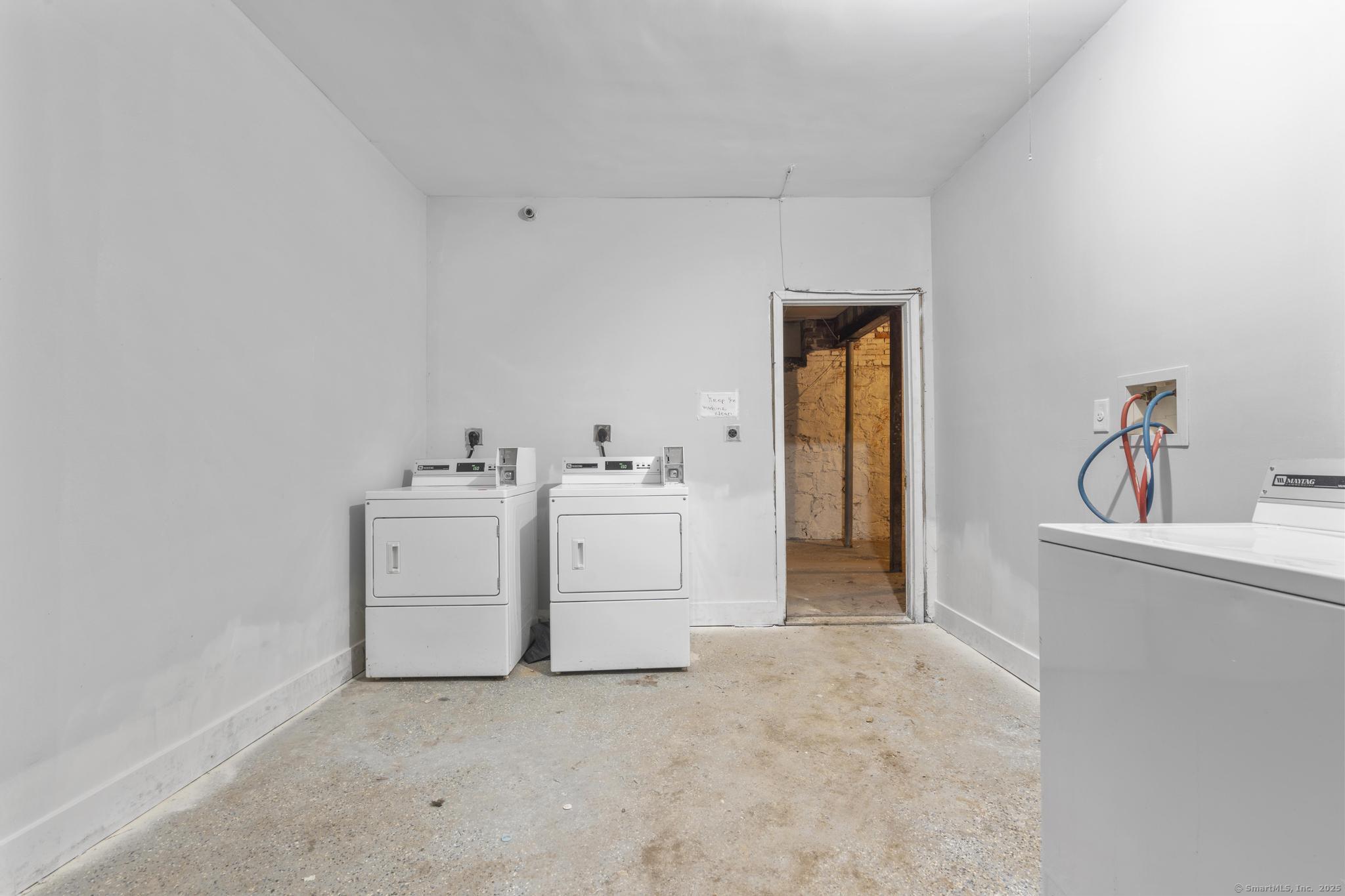 31 Whittier Street Bridgeport, CT 06605 - Photo 28 of 34 a utility room with sink dryer and washer