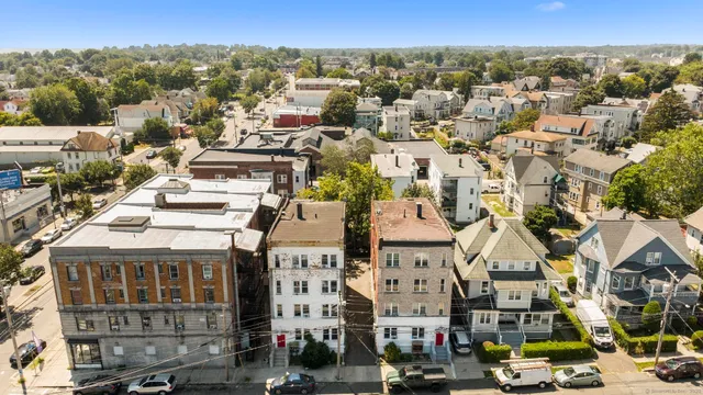 an aerial view of a city with lots of residential buildings