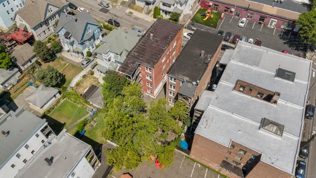 an aerial view of a city with lots of residential buildings