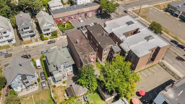 an aerial view of a city with lots of residential buildings