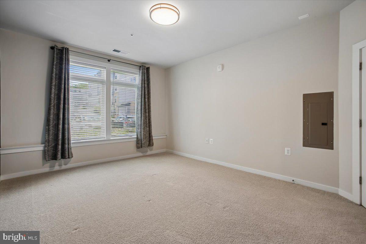 1669 Bandit Loop, Unit 105A Reston, VA 20190 - Photo 20 of 58 Primary Bedroom w/Custom Blinds