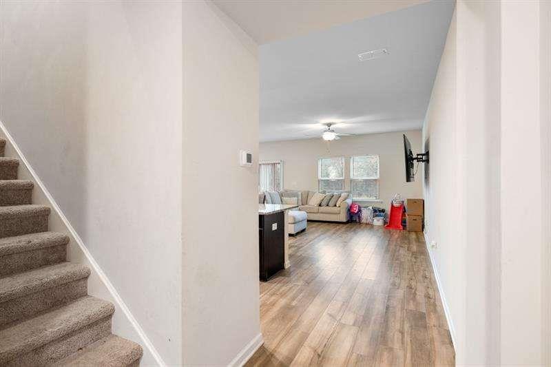 1070 Sunny Lk Drive Lawrenceville, GA 30043 - Photo 14 of 33 a view of a livingroom and wooden floor