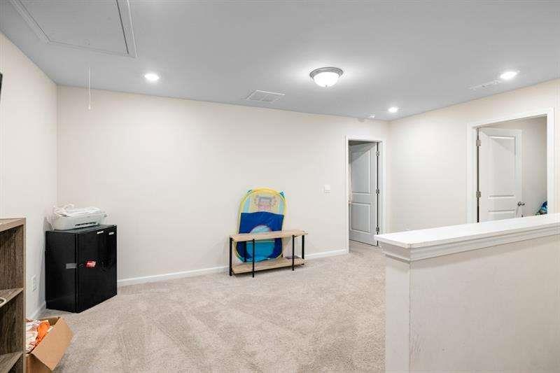 1070 Sunny Lk Drive Lawrenceville, GA 30043 - Photo 15 of 33 a living room with furniture and a table