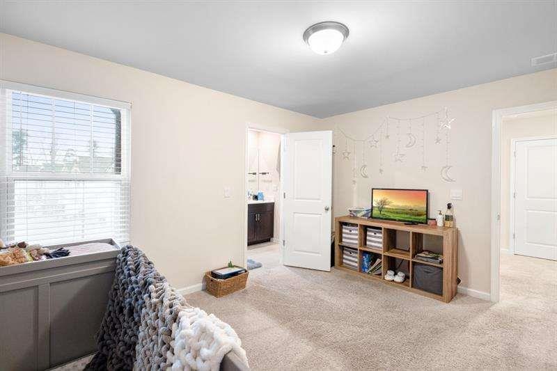 1070 Sunny Lk Drive Lawrenceville, GA 30043 - Photo 21 of 33 a view of a livingroom with furniture and windows