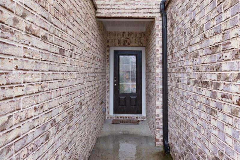 1070 Sunny Lk Drive Lawrenceville, GA 30043 - Photo 3 of 33 a building with a door