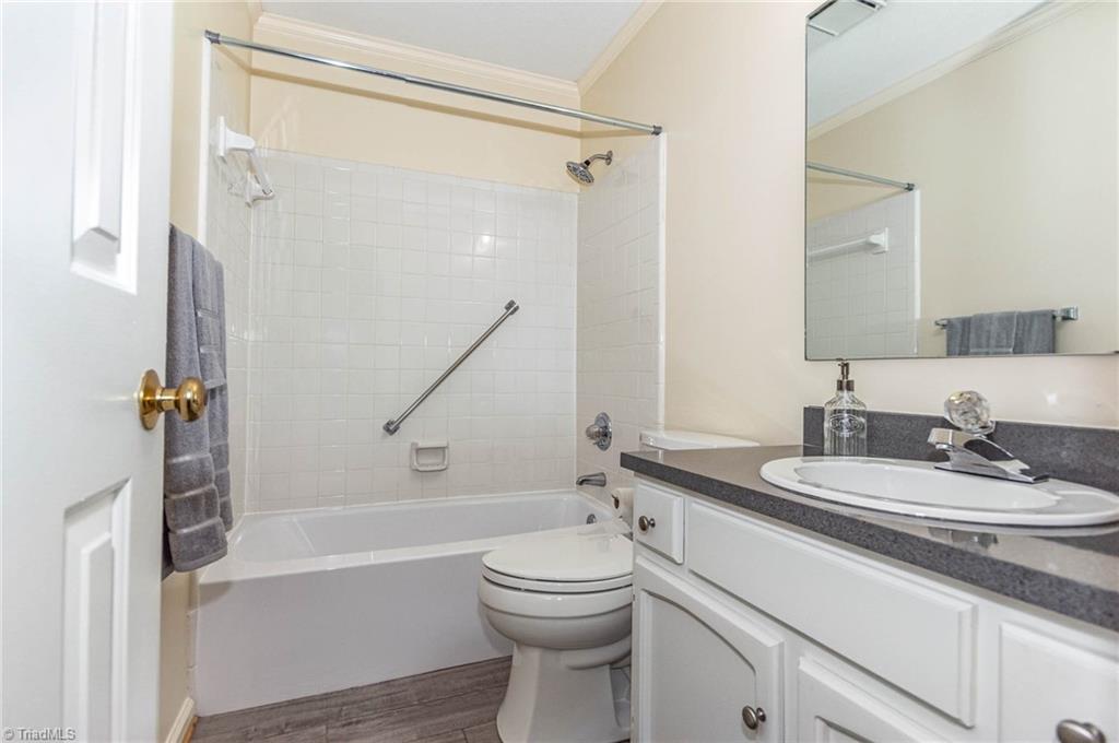 5000 Tower Road, Unit A Greensboro, NC 27410 - Photo 14 of 33 Another full bathroom right off the 2nd bedroom.