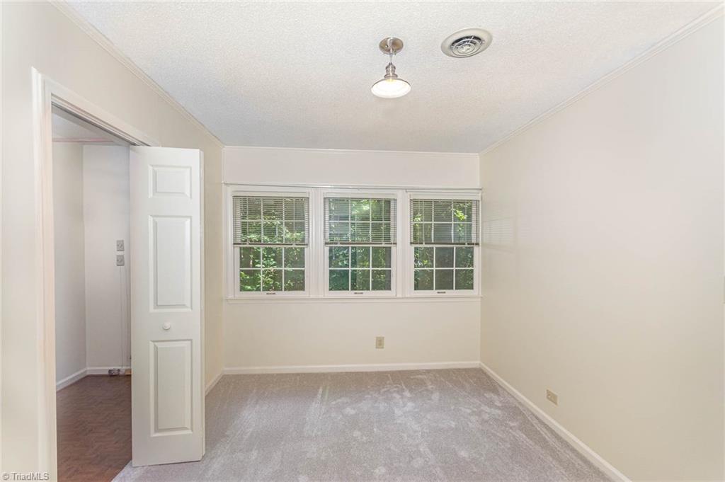 5000 Tower Road, Unit A Greensboro, NC 27410 - Photo 18 of 33 Bedroom connected to an office/bonus room.