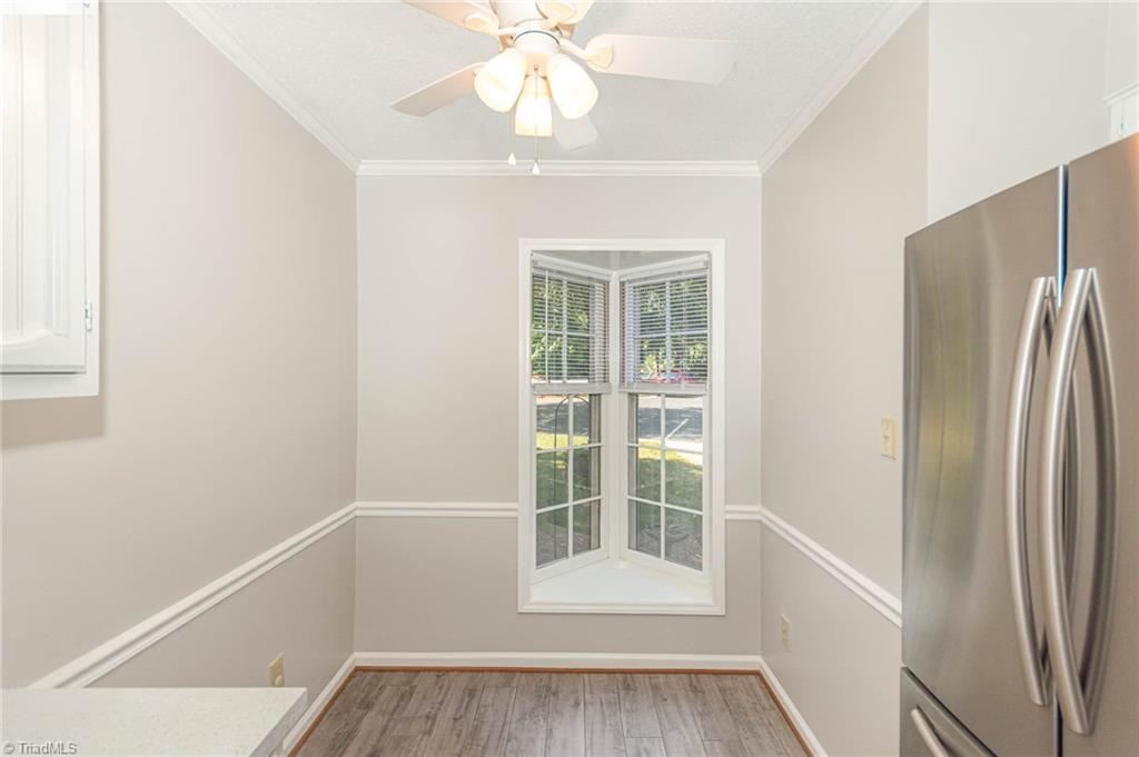 5000 Tower Road, Unit A Greensboro, NC 27410 - Photo 10 of 33 From the kitchen, easy access to the dining area and living space.