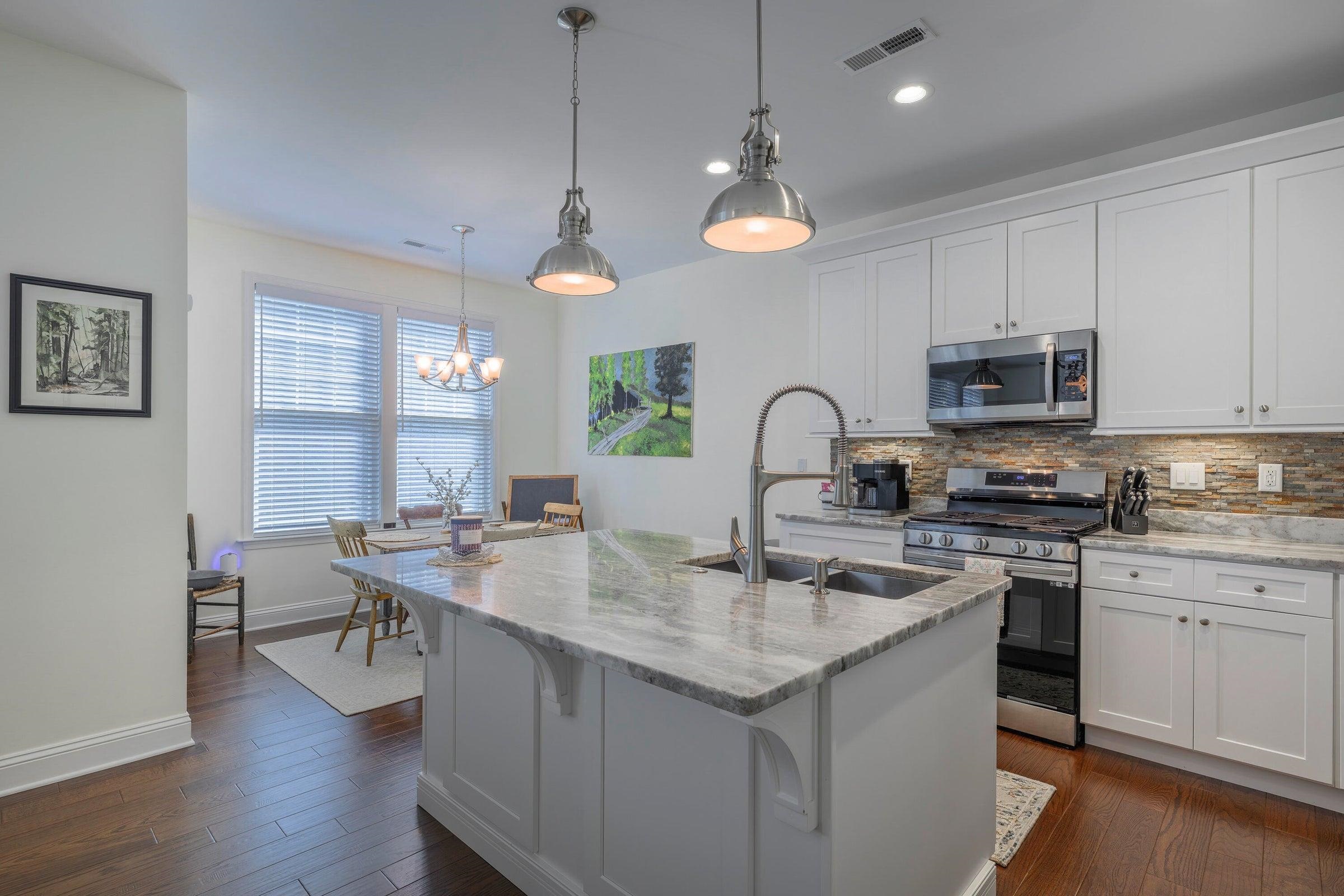 43 Chamberlain Loop Lexington, VA 24450 - Photo 14 of 47 Kitchen features granite countertops and stainless steel appliances.