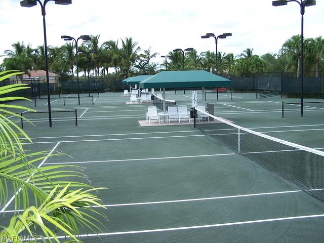 5137 Inagua Way Naples, FL 34119 - Photo 12 of 20 Har-Tru Tennis Courts