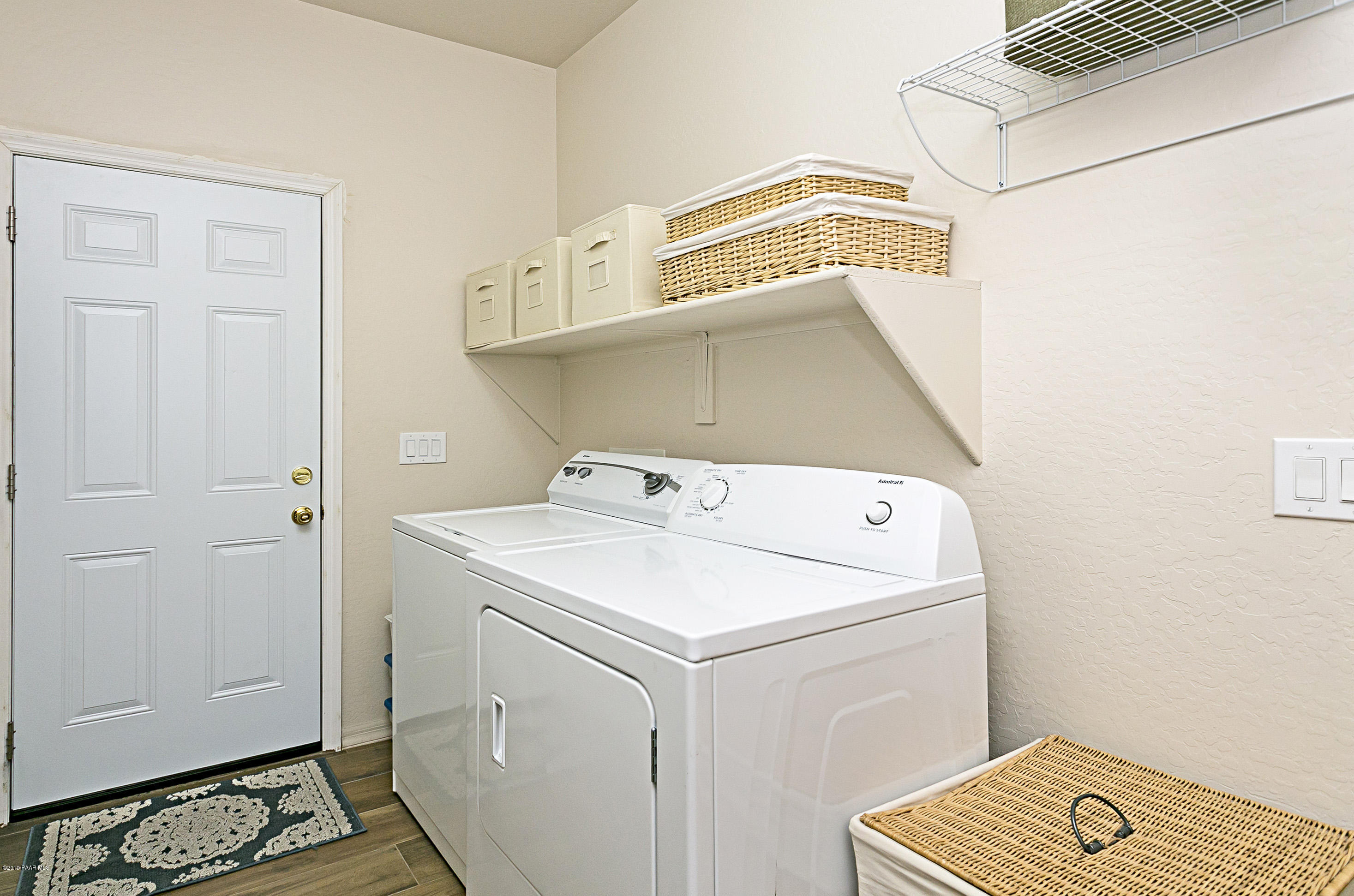 7257 Woolsey Ranch Road Prescott Valley, AZ 86314 - Photo 16 of 31 a utility room with dryer and washer