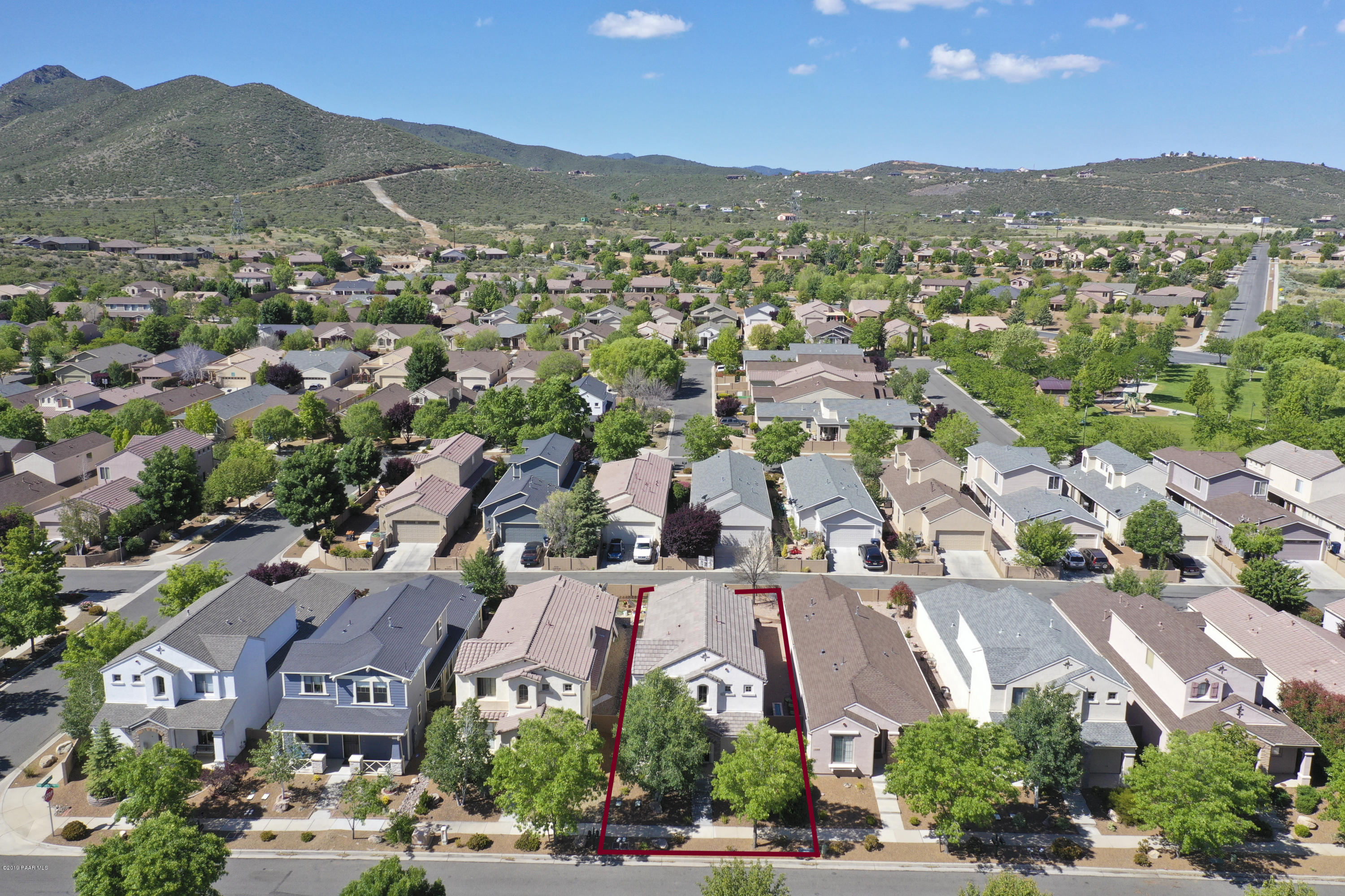 7257 Woolsey Ranch Road Prescott Valley, AZ 86314 - Photo 20 of 31 an aerial view of a city with lots of residential buildings