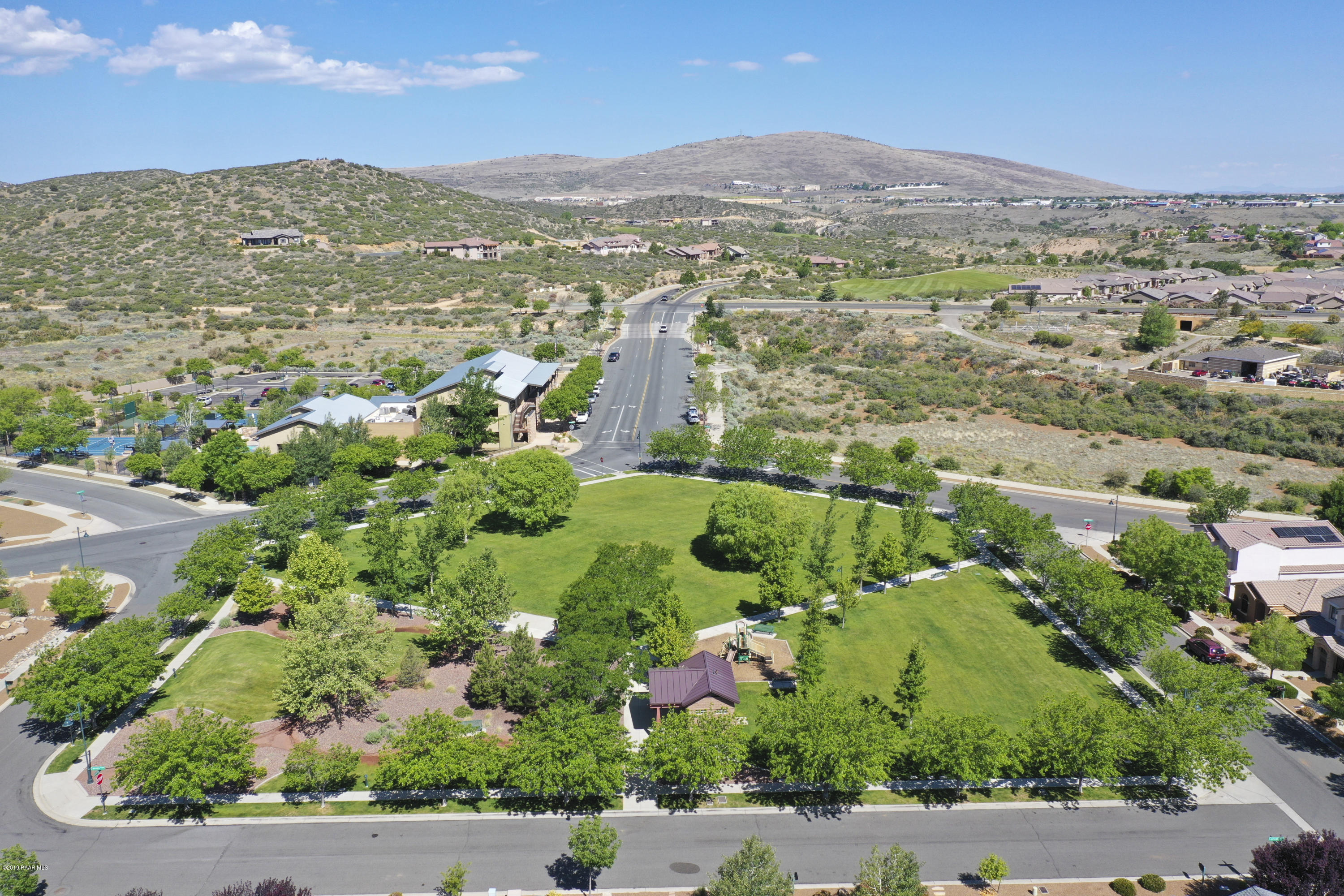 7257 Woolsey Ranch Road Prescott Valley, AZ 86314 - Photo 27 of 31 an aerial view of residential houses with outdoor space and trees
