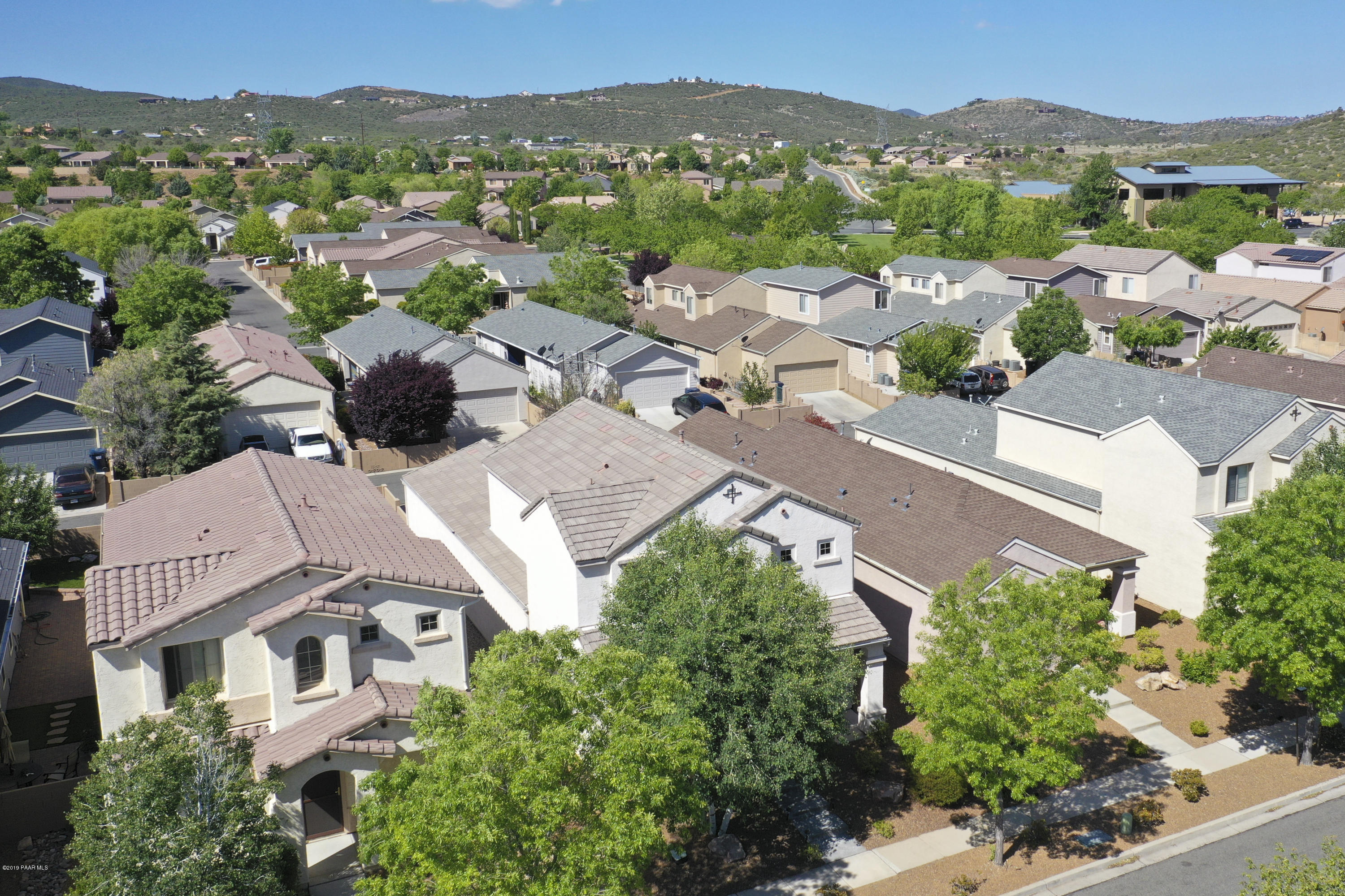 7257 Woolsey Ranch Road Prescott Valley, AZ 86314 - Photo 3 of 31 an aerial view of residential houses with outdoor space