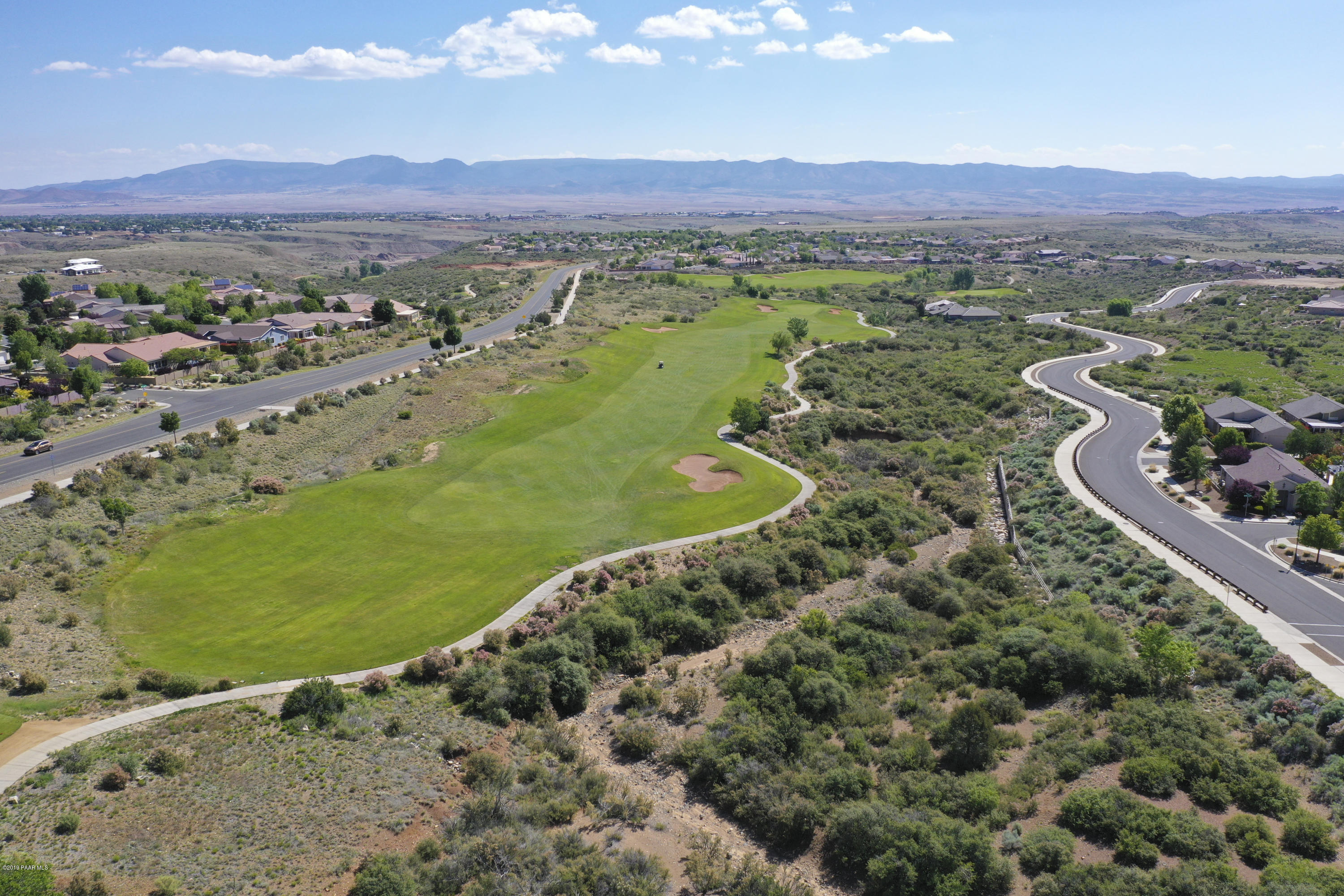 7257 Woolsey Ranch Road Prescott Valley, AZ 86314 - Photo 31 of 31 a view of a city with mountains in the background