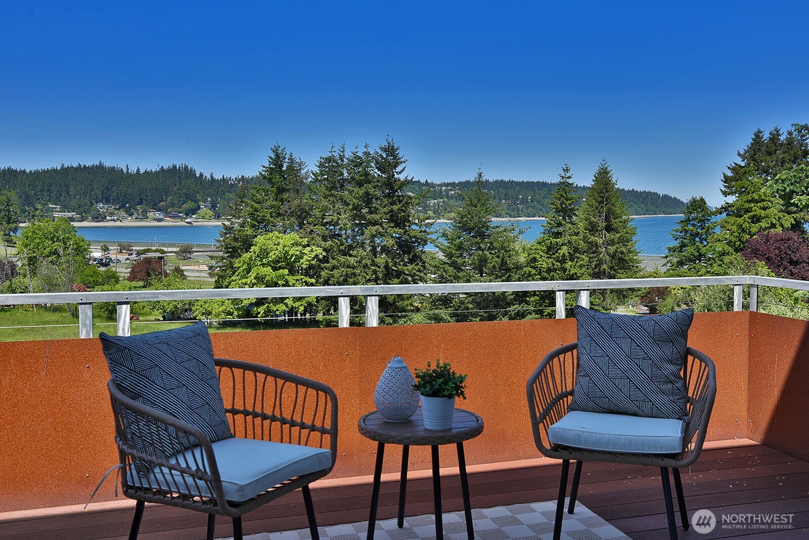 1649 Stewart Road Freeland, WA 98249 - Photo 17 of 40 a view of a chairs and table on the deck