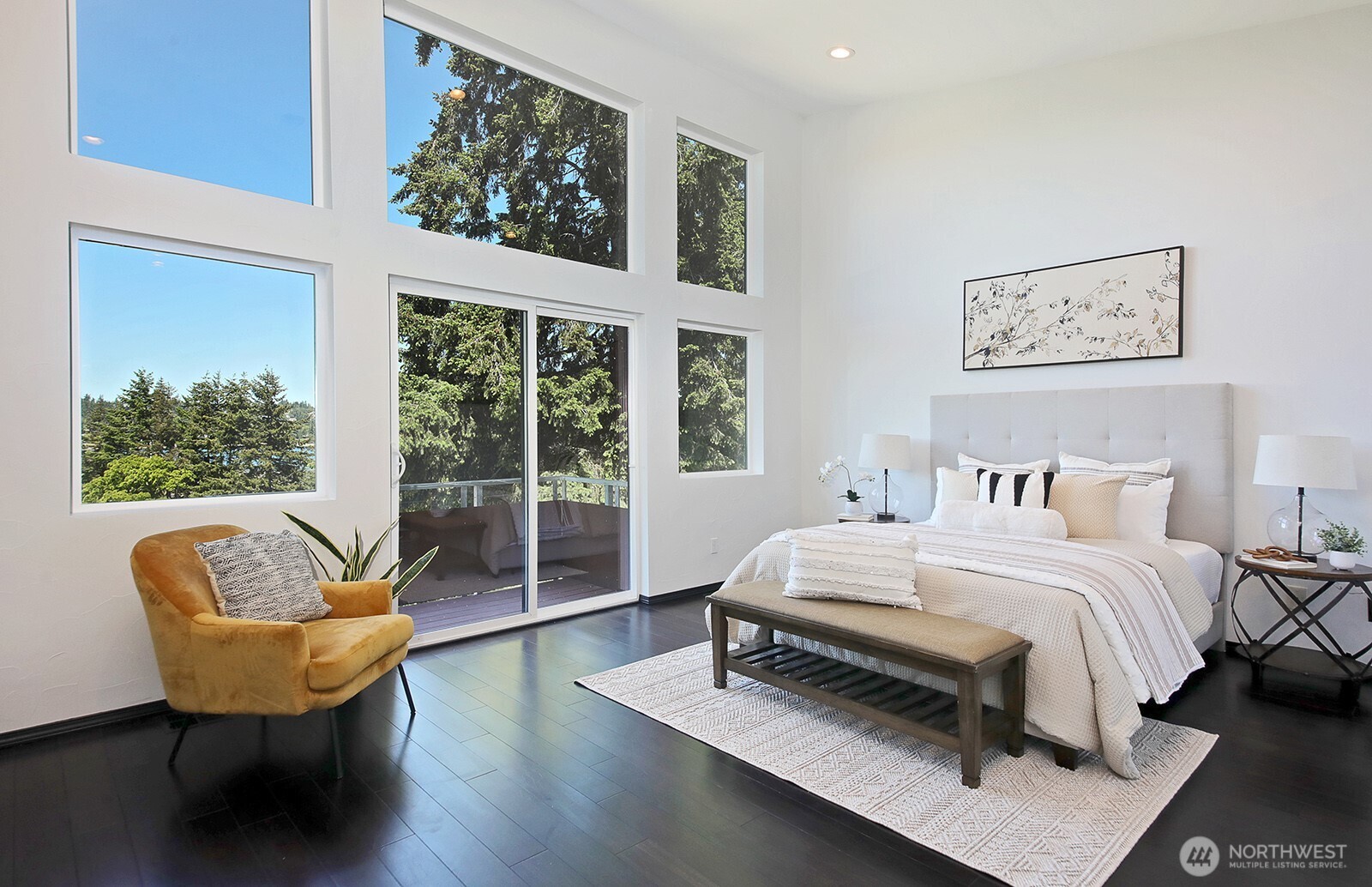 1649 Stewart Road Freeland, WA 98249 - Photo 27 of 40 a bedroom with a bed and a large window