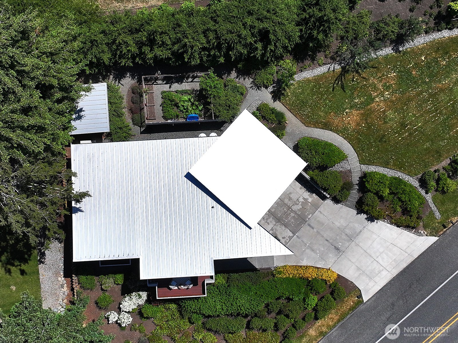 1649 Stewart Road Freeland, WA 98249 - Photo 5 of 40 an aerial view of house with yard and swimming pool