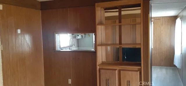 a room with a bed and a chair