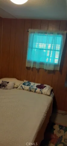 a kitchen with a sink and large window