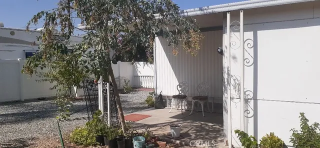 a view of a kitchen with stove and cabinets