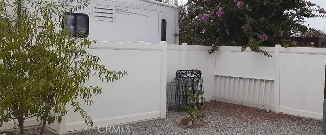 a kitchen with granite countertop a stove sink and cabinets