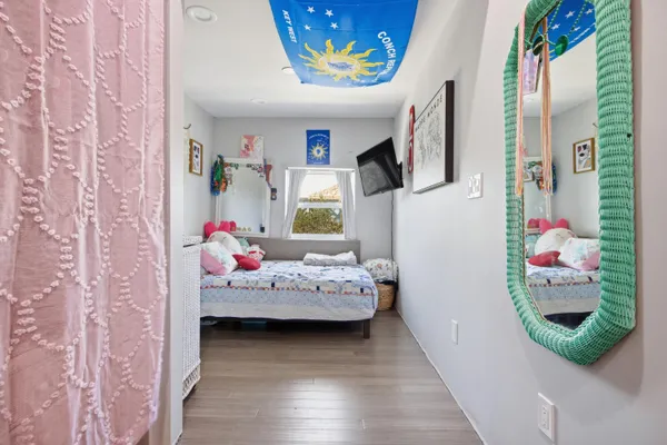 a terrace of a house with outdoor seating