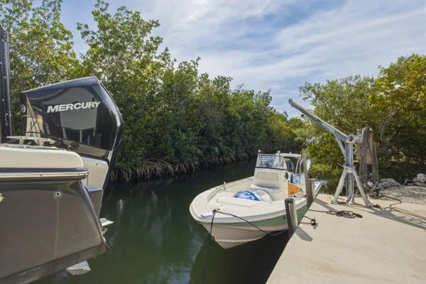 an aerial view of a house with a ocean view