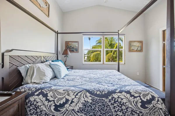 an aerial view of a house with a ocean view