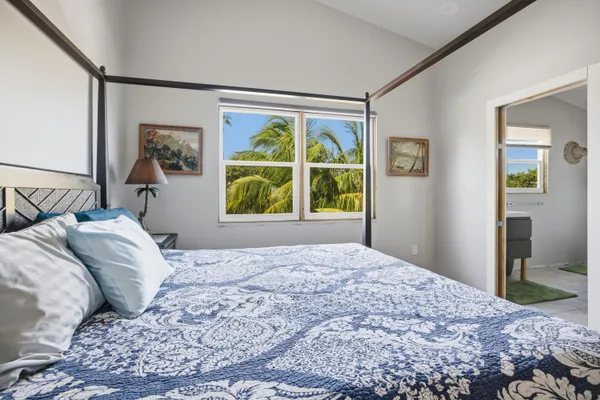 a kitchen with stainless steel appliances granite countertop a stove and a refrigerator