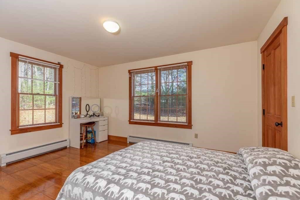 110 Whitney Road Phillipston, MA 01331 - Photo 11 of 26 a bedroom with a bed and a window