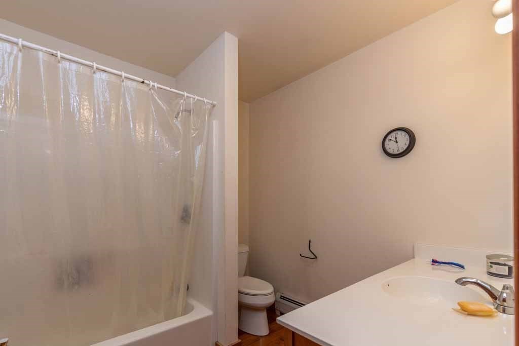 110 Whitney Road Phillipston, MA 01331 - Photo 13 of 26 a bathroom with a toilet and a sink