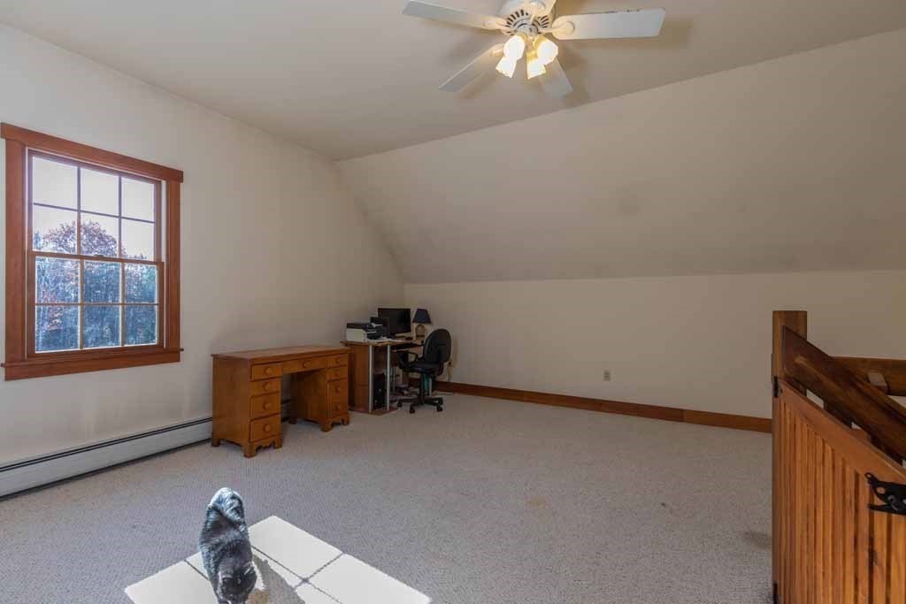 110 Whitney Road Phillipston, MA 01331 - Photo 14 of 26 a room with furniture and chandelier
