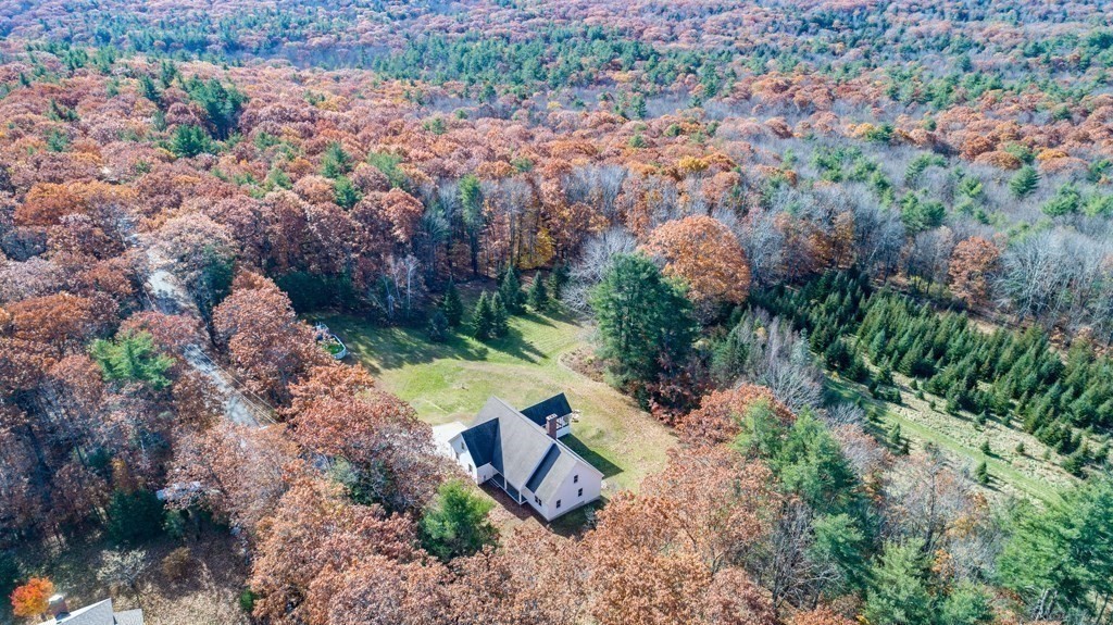 110 Whitney Road Phillipston, MA 01331 - Photo 25 of 26 an aerial view of a house with a yard and lake view