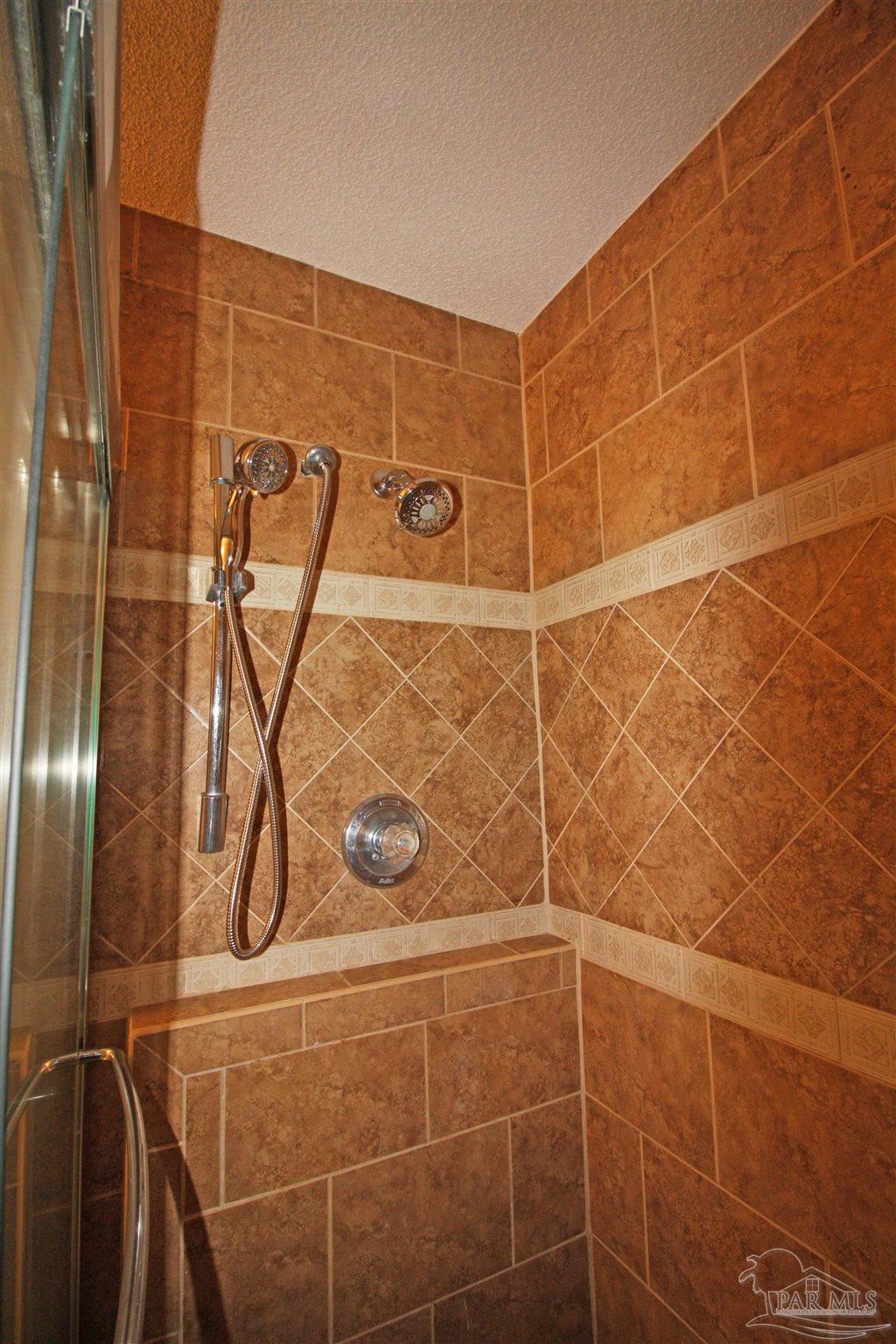 3735 Berrypatch Lane Pace, FL 32571 - Photo 29 of 46 a bathroom with a shower
