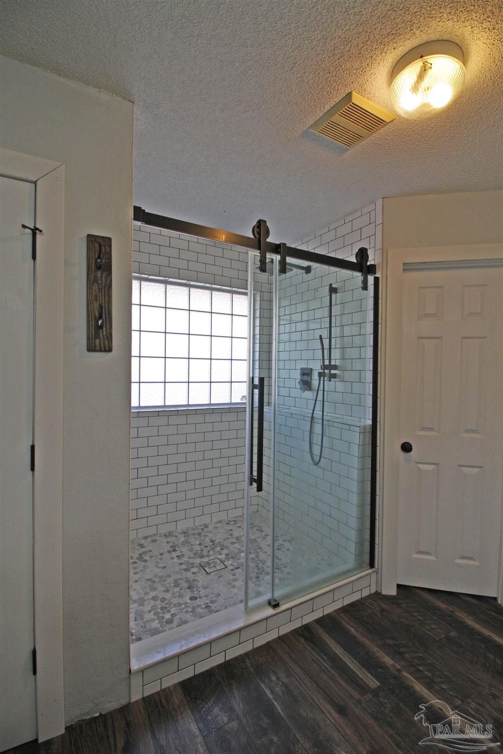 3735 Berrypatch Lane Pace, FL 32571 - Photo 40 of 46 a bathroom with a shower