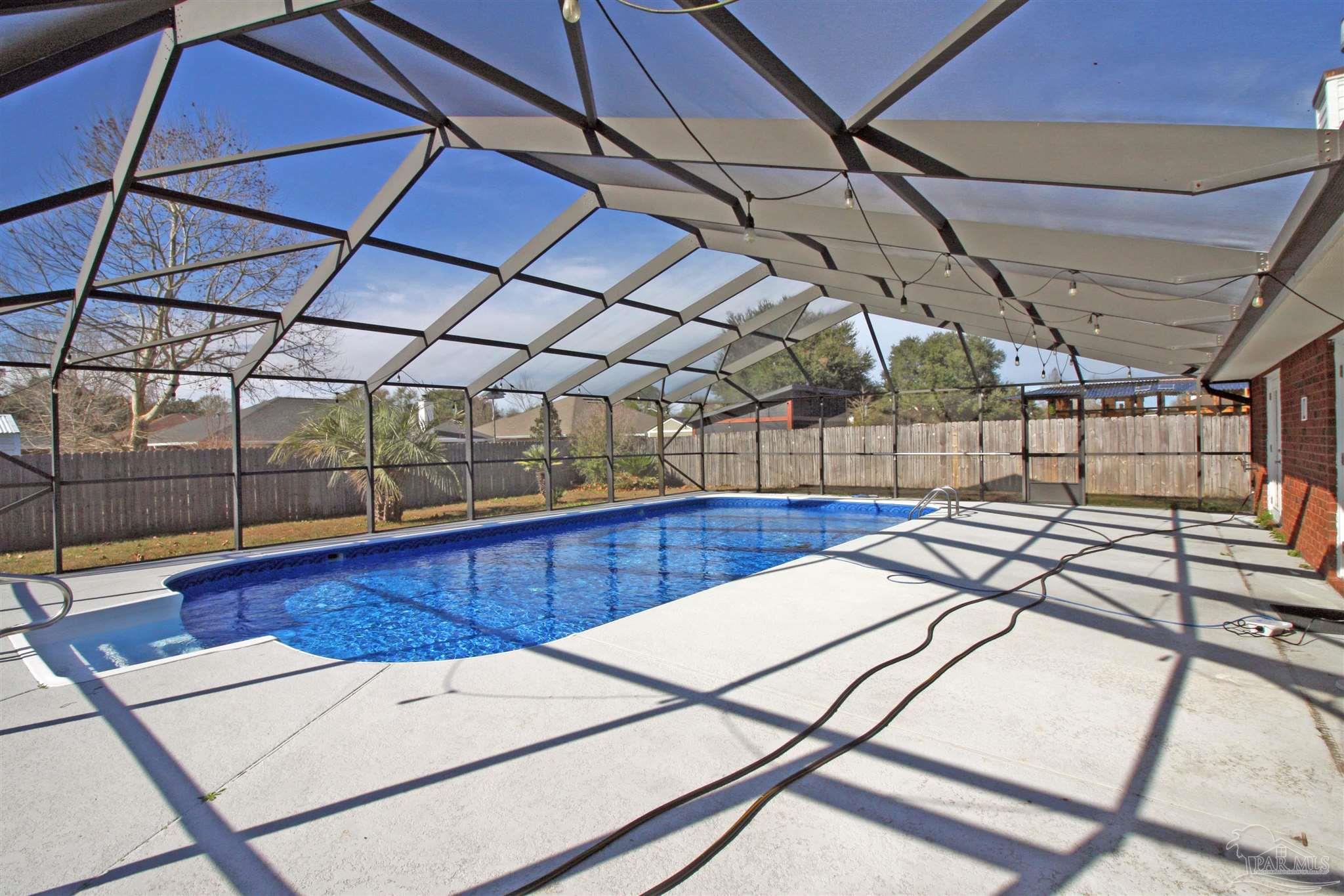 3735 Berrypatch Lane Pace, FL 32571 - Photo 4 of 46 a view of a indoor swimming pool