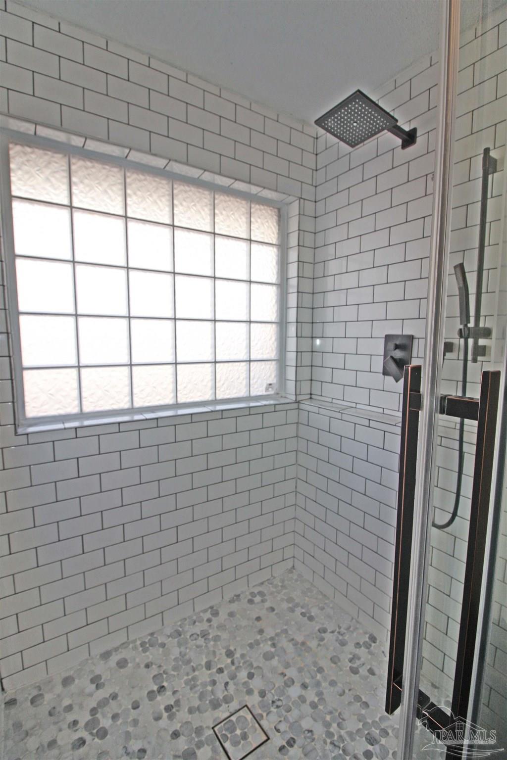 3735 Berrypatch Lane Pace, FL 32571 - Photo 41 of 46 a bathroom with a shower