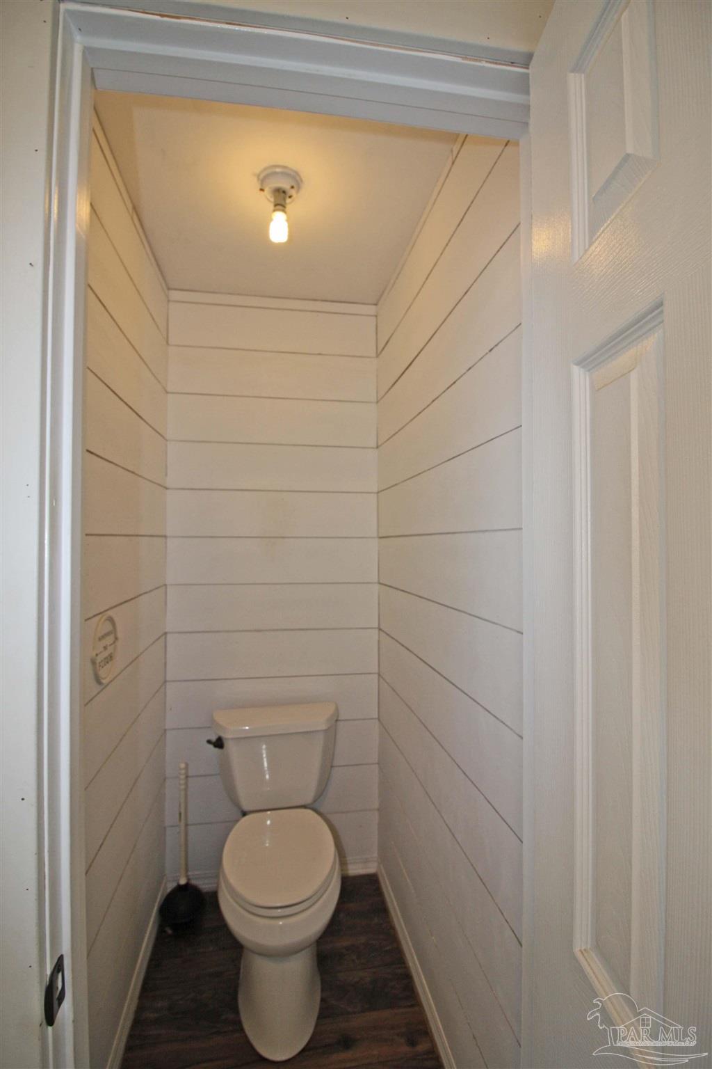 3735 Berrypatch Lane Pace, FL 32571 - Photo 42 of 46 a bathroom with a toilet and a sink