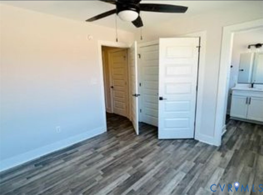 77 Allure Drive Rustburg, VA 24588 - Photo 8 of 10 an empty room with wooden floor closet and windows