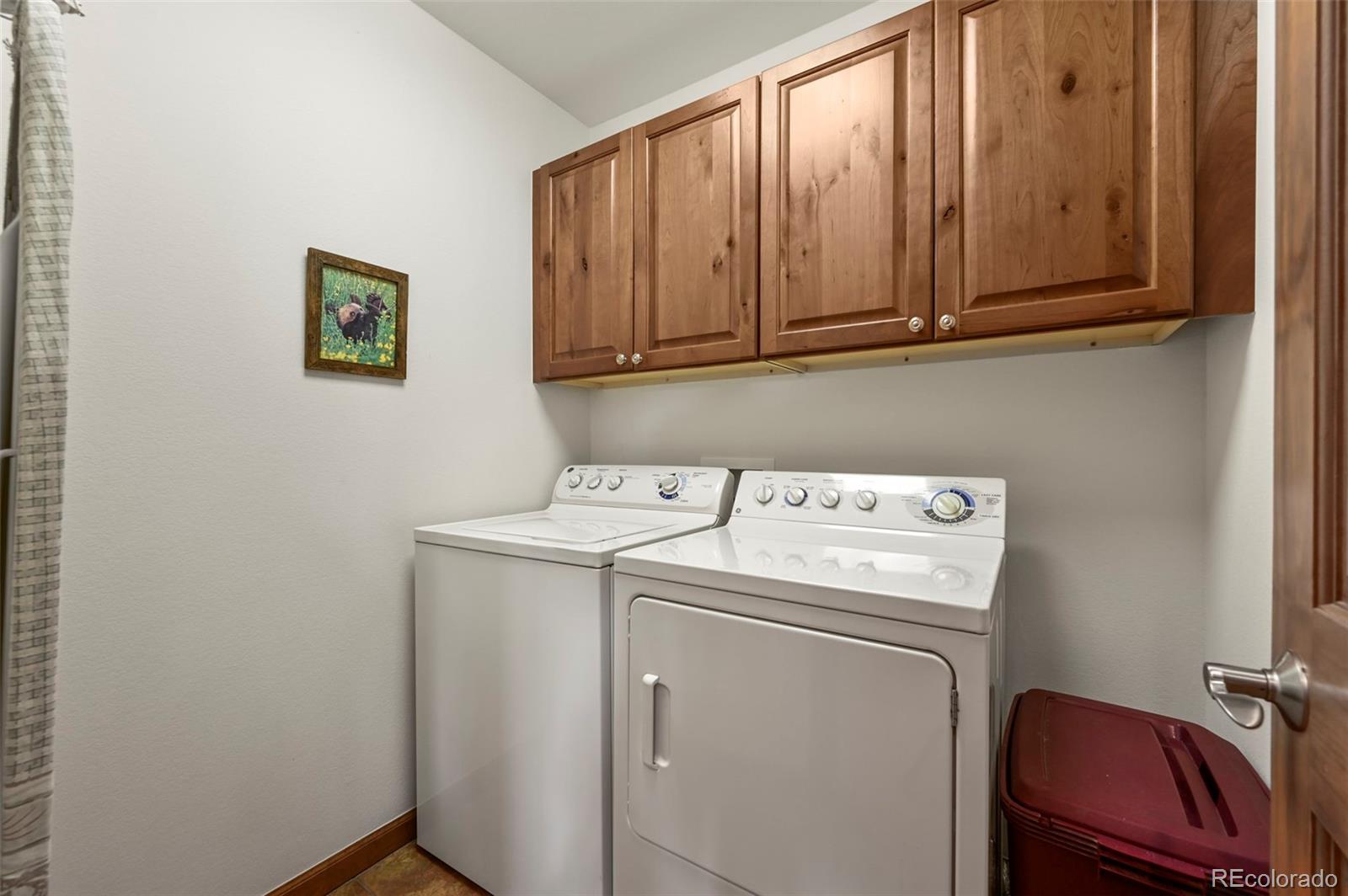 322 Sequoia Road Hartsel, CO 80449 - Photo 15 of 50 a utility room with dryer and washer