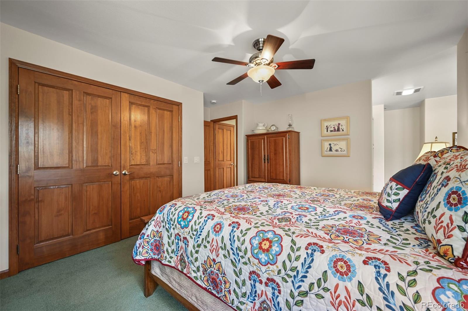 322 Sequoia Road Hartsel, CO 80449 - Photo 17 of 50 a bedroom with a bed and a dresser