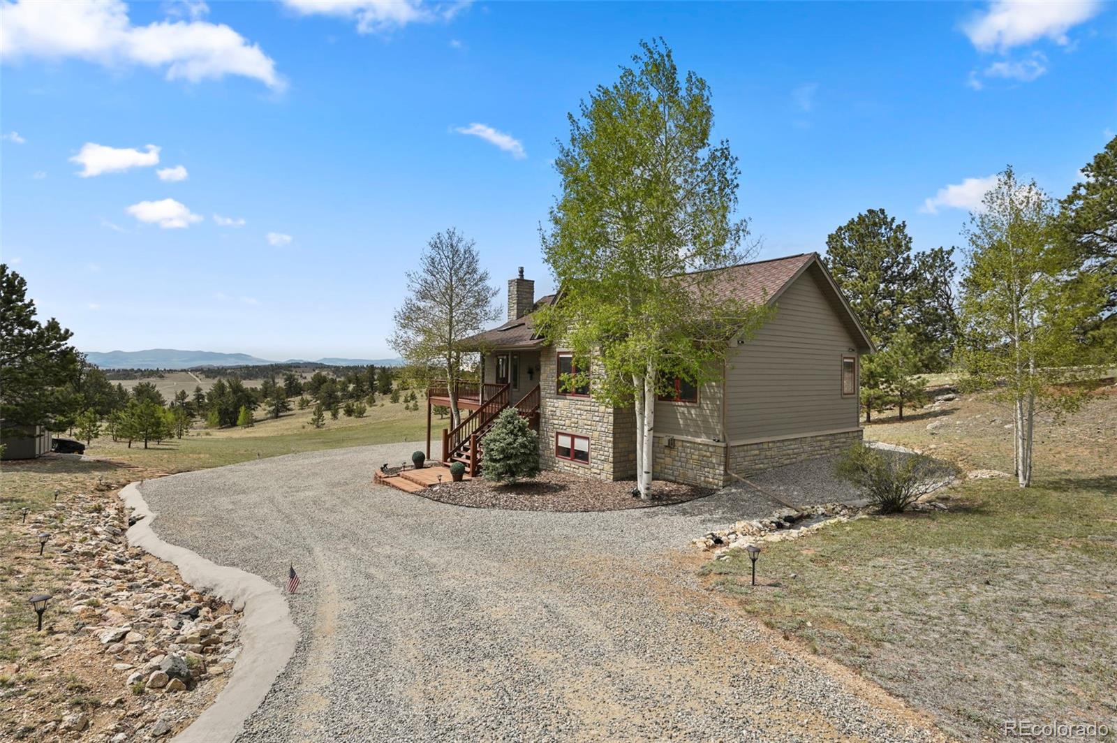322 Sequoia Road Hartsel, CO 80449 - Photo 2 of 50 a view of a dry yard with trees