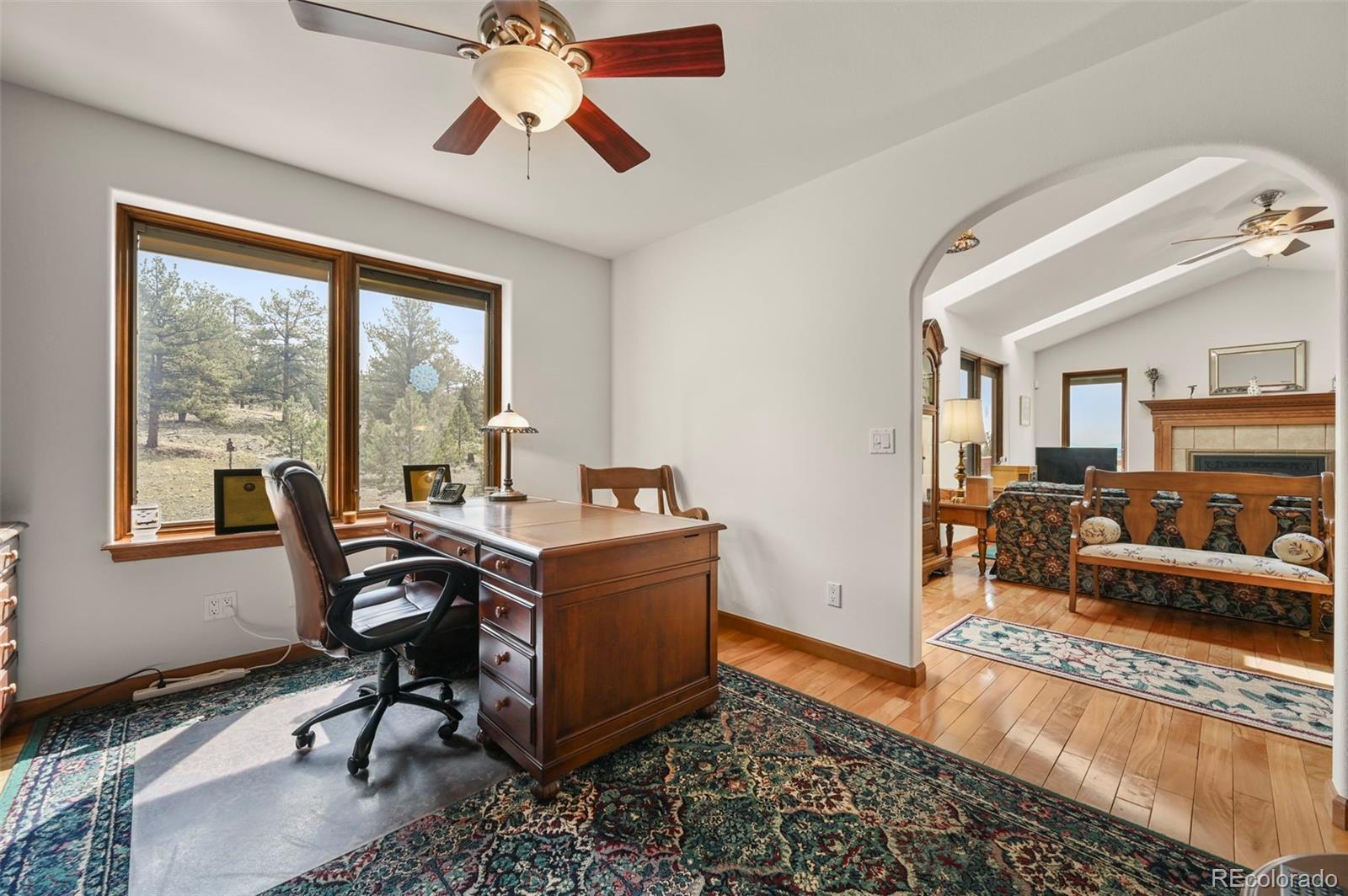 322 Sequoia Road Hartsel, CO 80449 - Photo 22 of 50 a view of a workspace with furniture and a window
