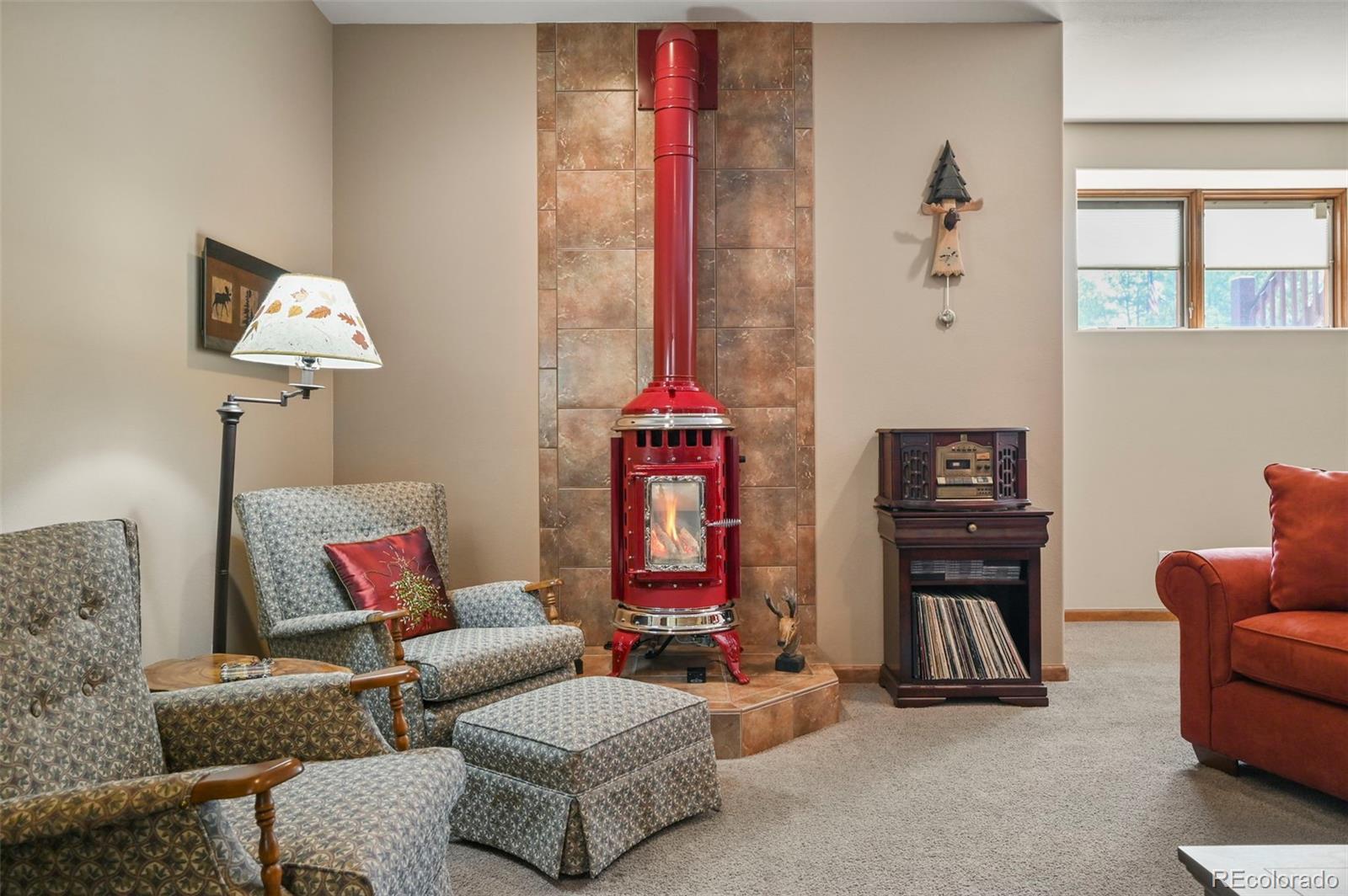 322 Sequoia Road Hartsel, CO 80449 - Photo 28 of 50 a living room with furniture and a window