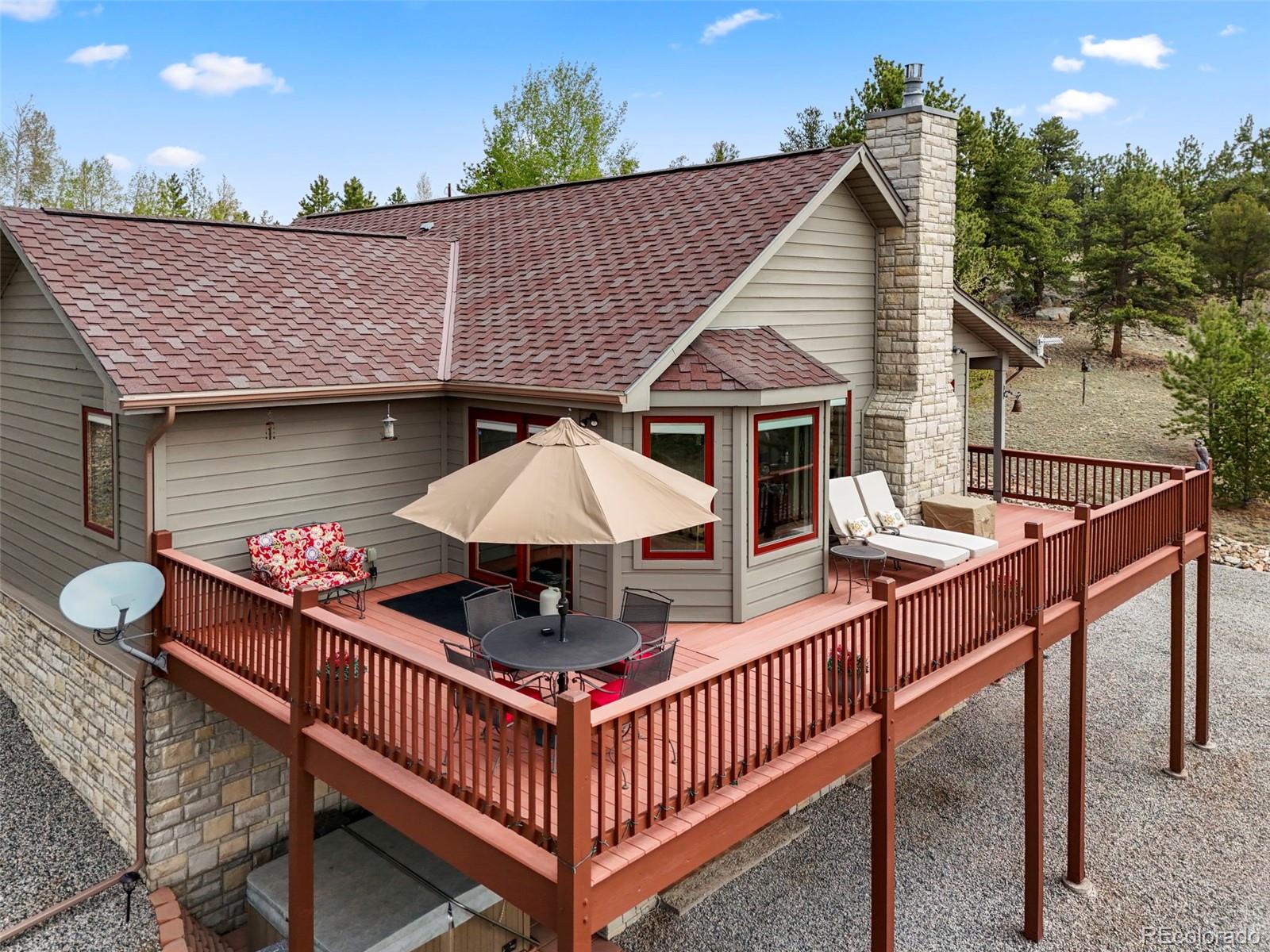 322 Sequoia Road Hartsel, CO 80449 - Photo 37 of 50 a view of a deck with furniture and a yard