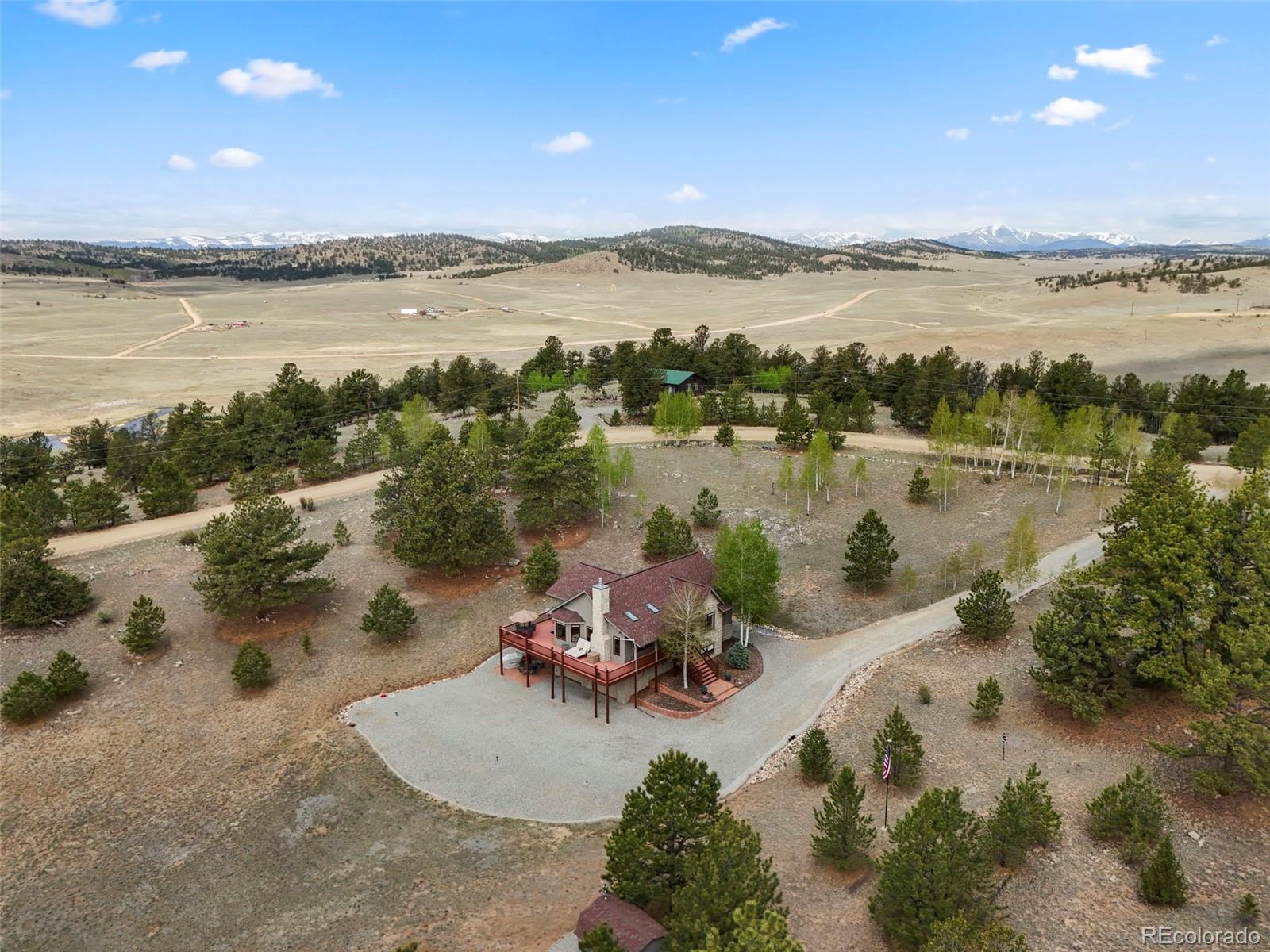 322 Sequoia Road Hartsel, CO 80449 - Photo 44 of 50 a view of a lake with a mountain
