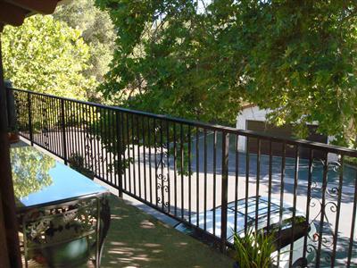 Access to the balcony from both living room and dining area.