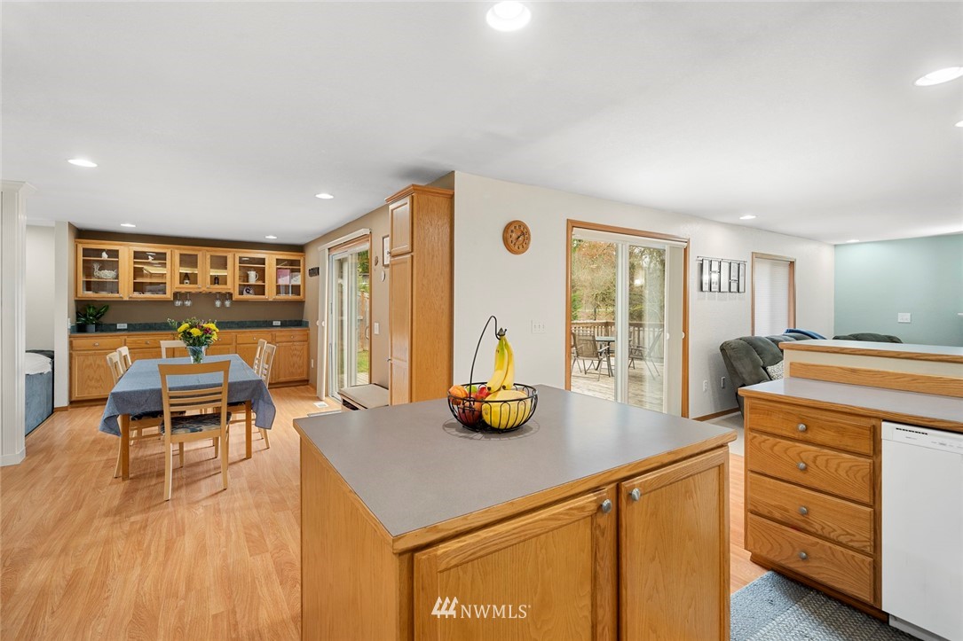 2202 179th Street Southeast Bothell, WA 98012 - Photo 8 of 31 a kitchen with a table and chairs