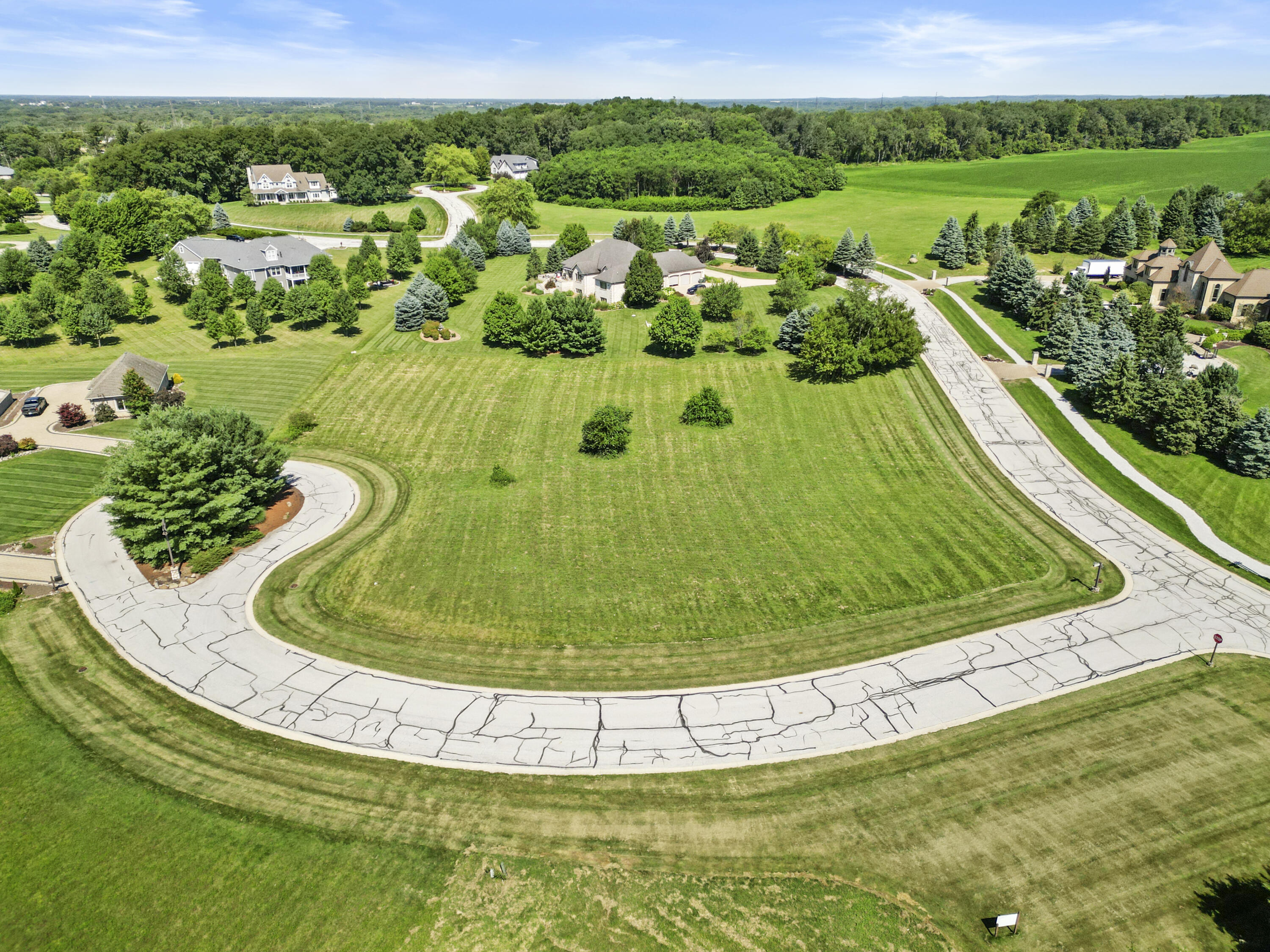 2960 Spring Rain Court Valparaiso, IN 46385 - Photo 6 of 14 a view of a swimming pool with a garden